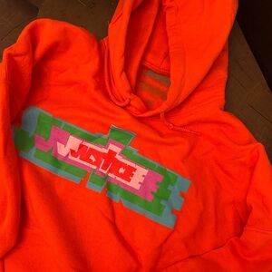 Justice tour hoodie merch